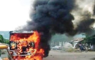 Dangote truck kills father, son in Kogi as youths fume